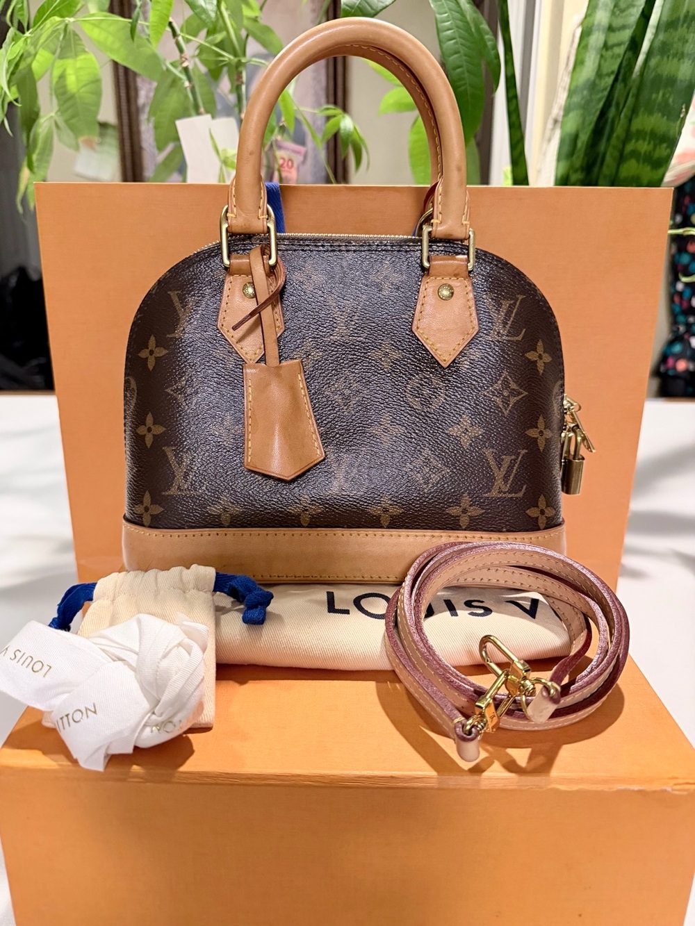 Louis Vuitton Monogram Alma BB Satchel in Brown and Natural Vachetta authentic